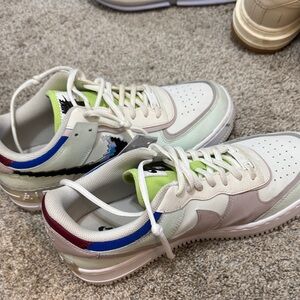 Nike Sneakers with Cream and Blue Accents